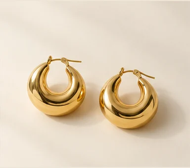 Pair of rounded gold-tone hoop earrings